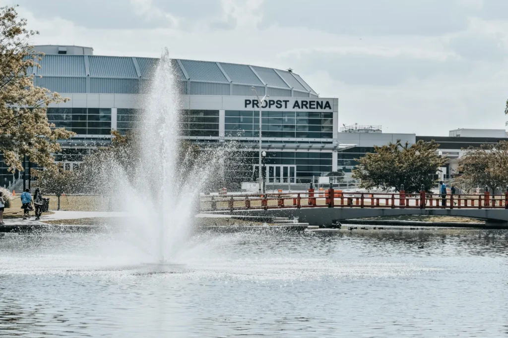 Big Spring Park fountain with Propst Arena behind it in downtown Huntsville, Alabama